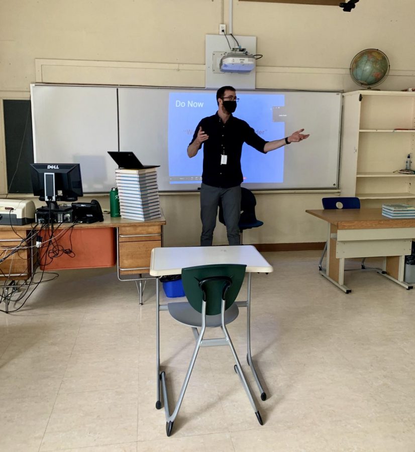 Mr. Talay teaches with a positioned computer so that he can see Zoom students along with students physically in the class.