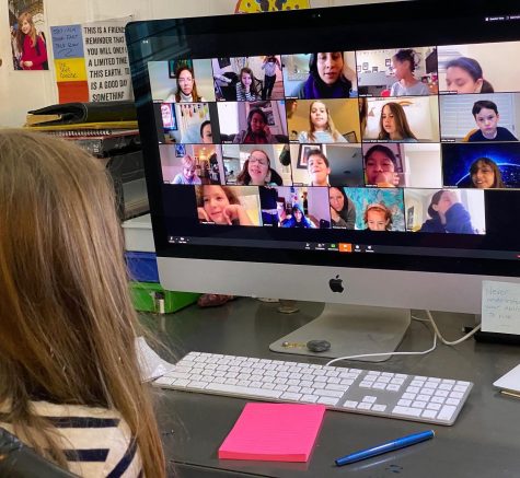 A student learns from home through Zoom.