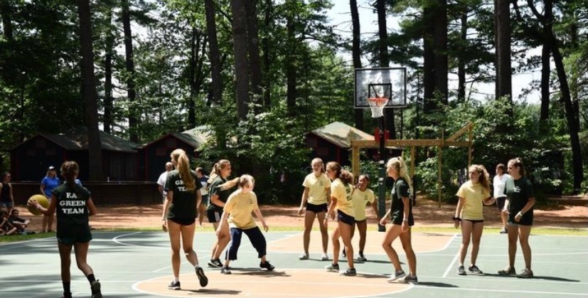 Campers play a classic game of summer camp basketball.