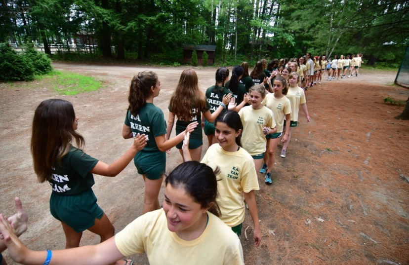 Campers+at+a+pre-COVID-19+summer+camp+participate+in+traditions.