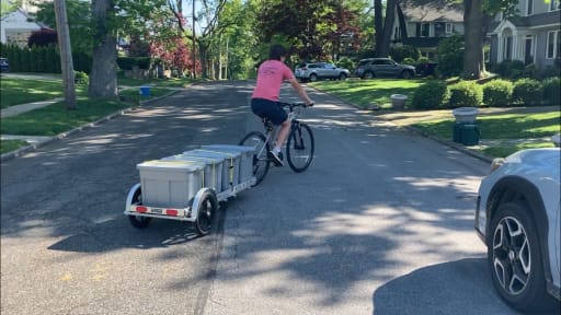 Original Civic Research & Action students encourage residents to lower their environmental footprint by making it easy for them to recycle their food scraps by picking them up on bike.