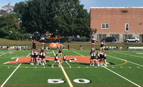 The MHS Varsity Cheer Team performs at the pep rally, helping to elevate that school spirit.