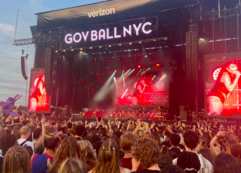 The main stage at GovBall NYC crowded with excited concert-goers watching Megan Thee Stallion.