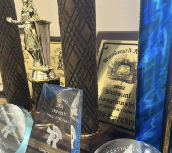 Lee’s collection of trophies from past successful debate tournaments.