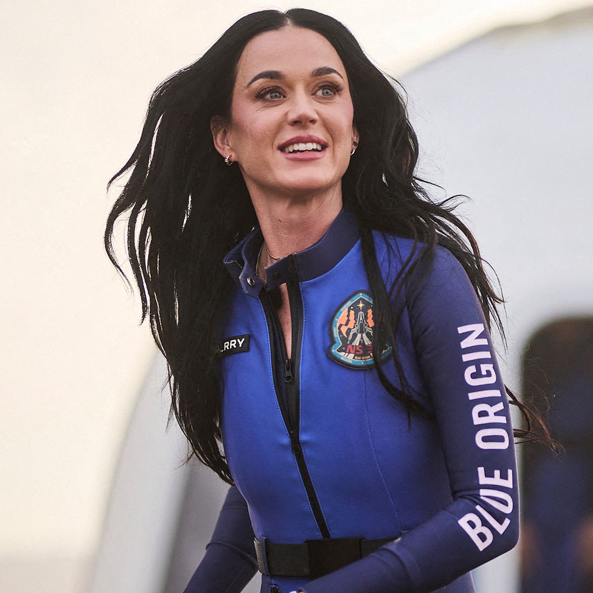Katy Perry emerges from Blue Origin spacecraft after her trip to space